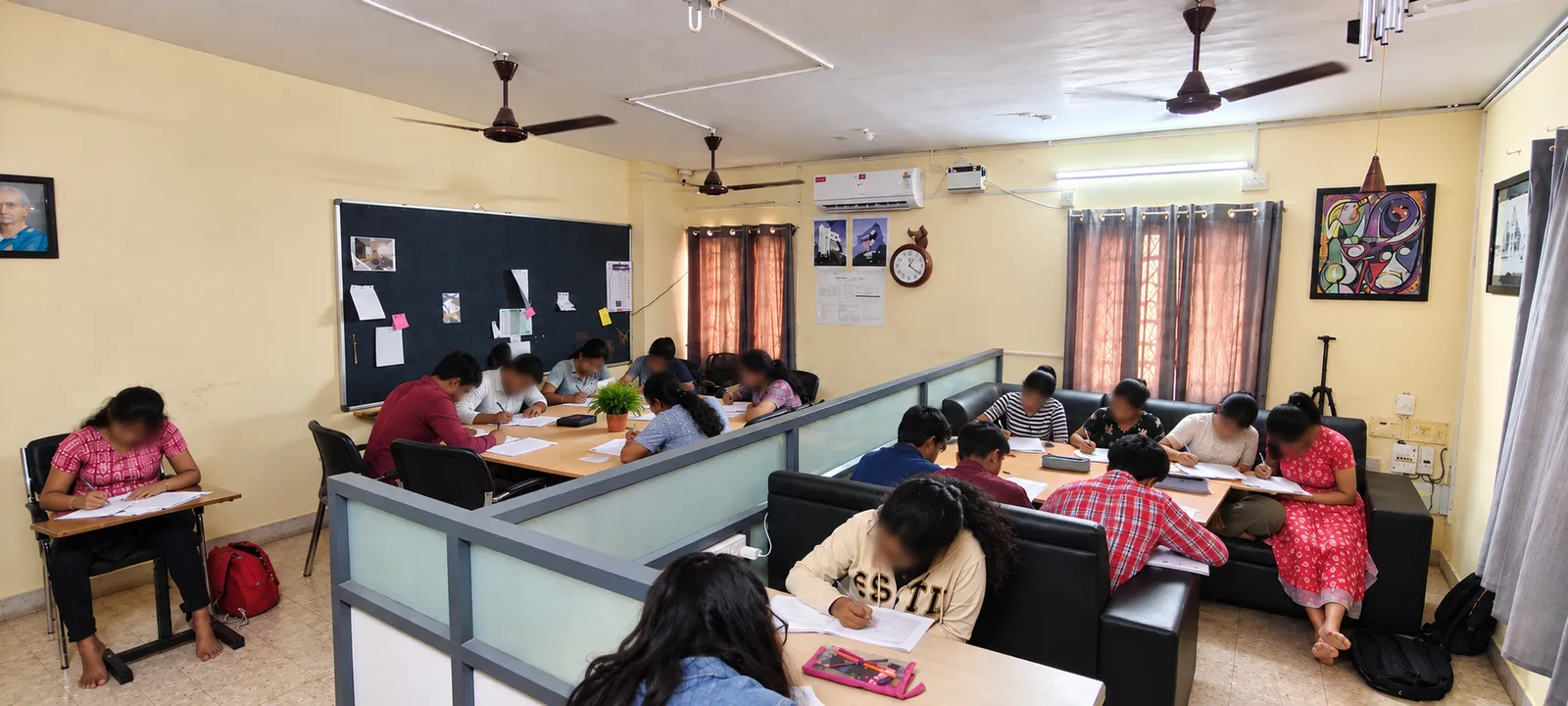 Outside, with the signboard at Neram Classes, Coimbatore